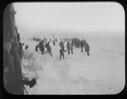 Image of Many sealers on snow by vessel